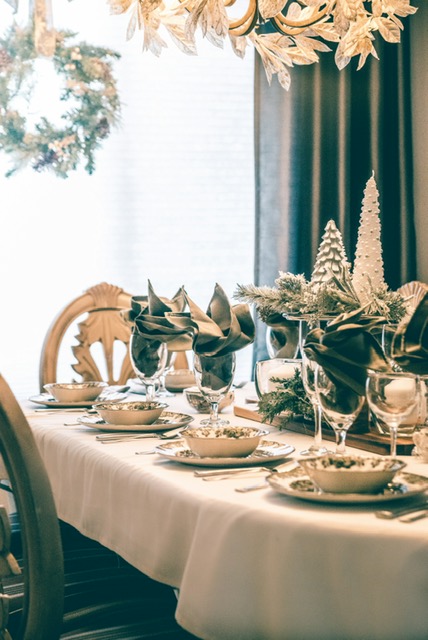 Signature Maison Lucia table setup with candles and florals